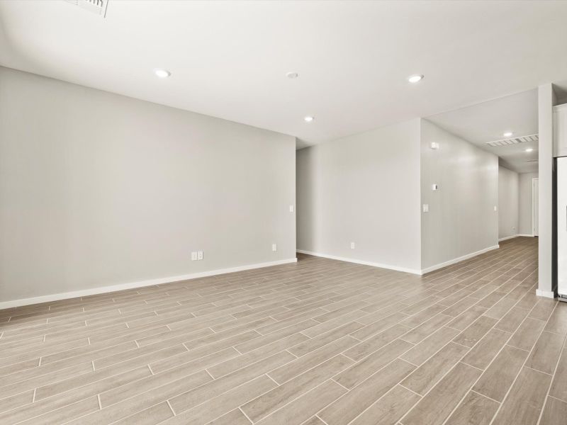 Spacious, unfurnished interior of a new home in Blossom Rock Reserve Series, Apache Junction (Image 10).