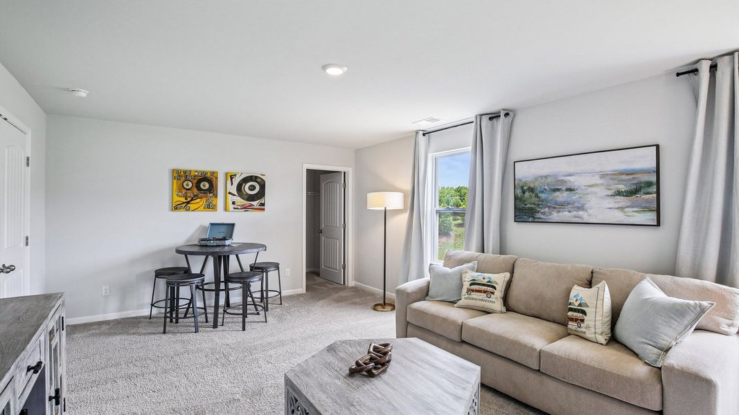 Furnished interior view inside a new home in The Parks, White House (Image 10).