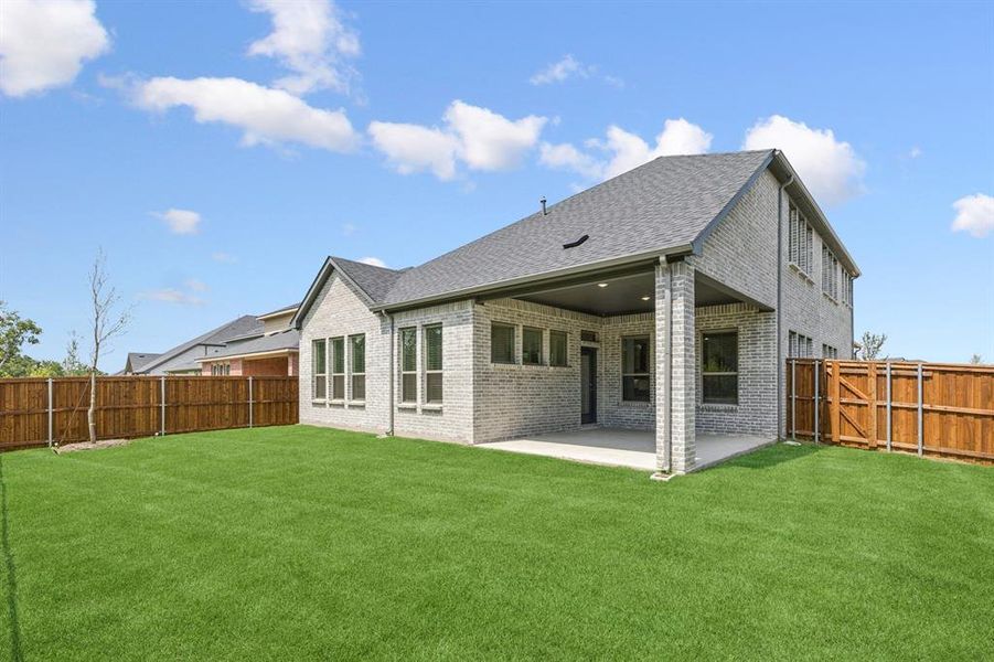 Covered Patio in the Da Vinci II home plan by Trophy Signature Homes – REPRESENTATIVE PHOTO Covered Patio in the Da Vinci II home plan by Trophy Signature Homes – REPRESENTATIVE PHOTO