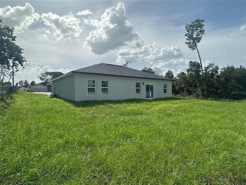 Exterior details and patio area of a home in , Ocala (Image 4).