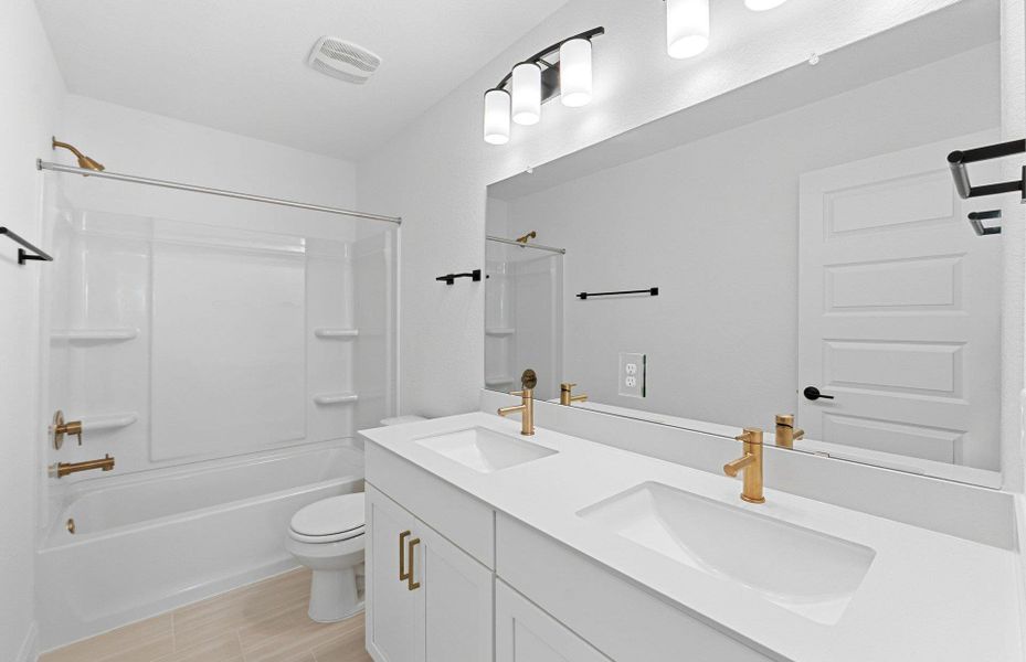 Full bath with tub / shower combination and double vanity Full bath with tub / shower combination and double vanity
