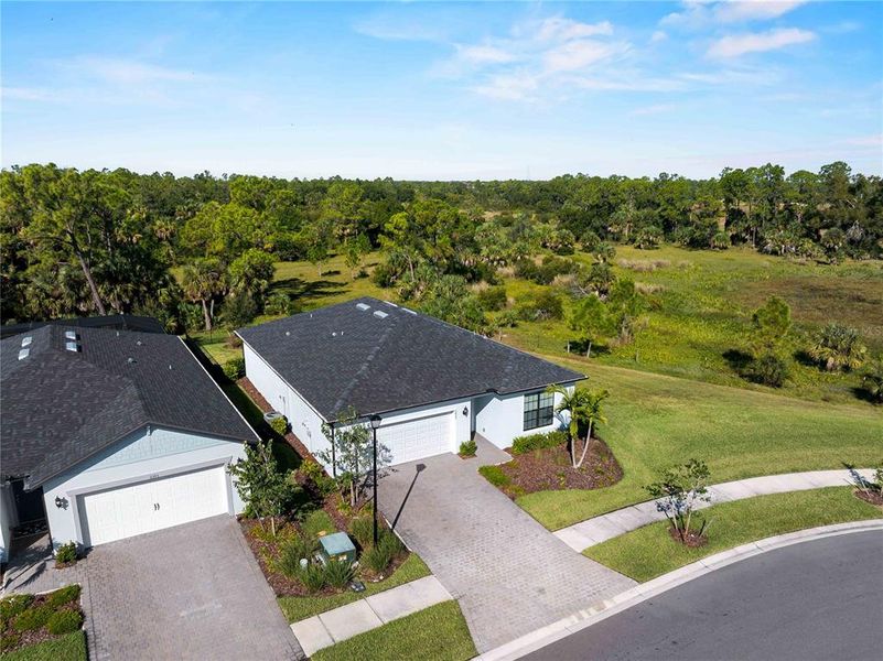Front exterior of a new home in , North Port, FL, highlighting curb appeal (Image 2). Front exterior of a new home in , North Port, FL, highlighting curb appeal (Image 2).