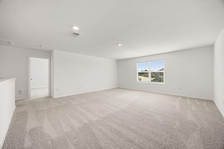 Upstairs you'll find a massive game room with endless possibilities. Whether you need a media room, playroom, homeschool space, home gym, or second living area, this flexible space can easily adapt to your needs.