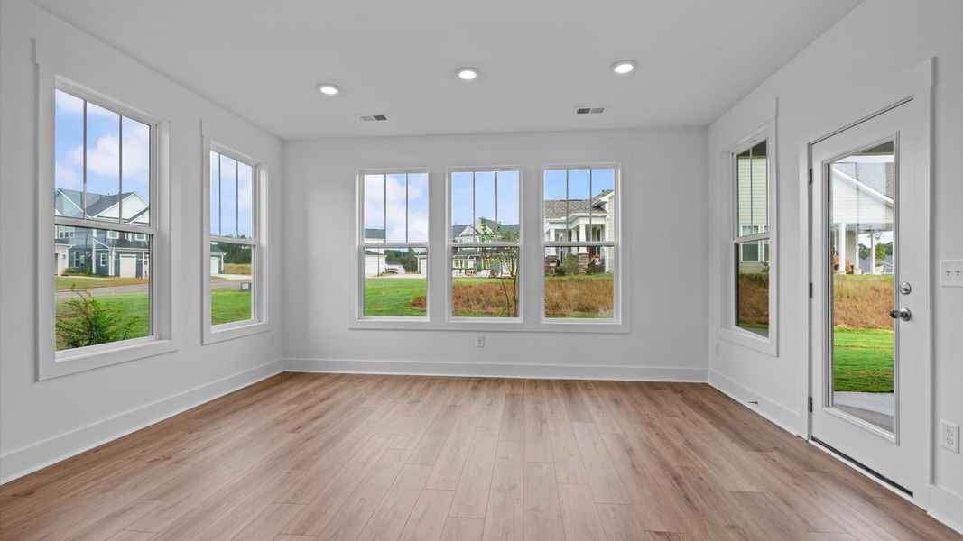 Open-concept extended breakfast area with thoughtful flow—perfect for entertaining in this first-class home