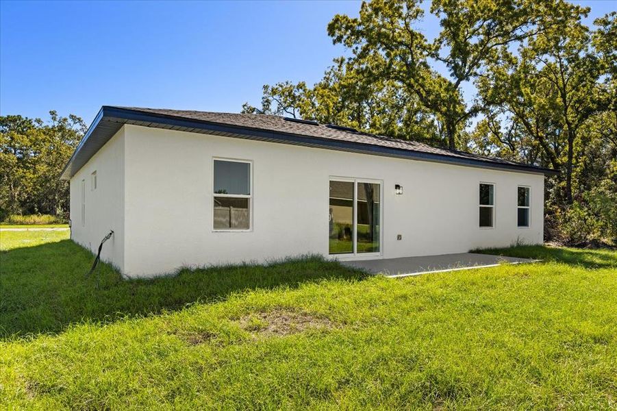Exterior details and patio area of a home in , Ocala (Image 4).