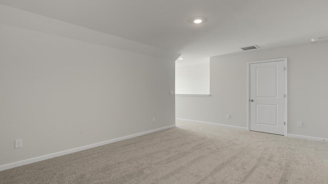 Spacious, unfurnished interior of a new home in Indigo Preserve, Leland (Image 30).
