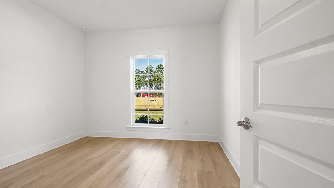 Representative unfurnished interior of a home built from the Pier by D.R. Horton in Breakfast Point East Phase II, Panama City Beach (Image 26).