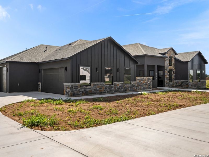 Front exterior of a new home in , Seguin, TX, highlighting curb appeal (Image 32). Front exterior of a new home in , Seguin, TX, highlighting curb appeal (Image 32).