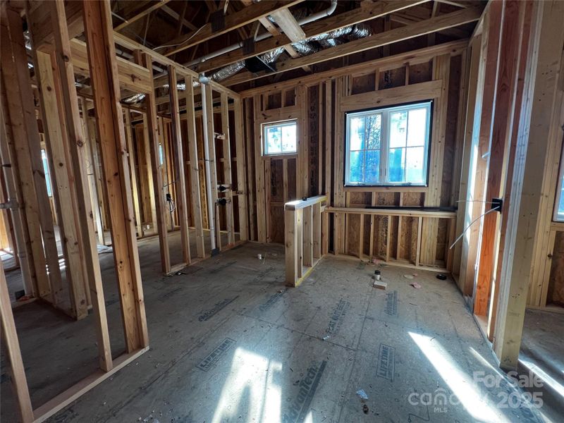 The primary bathroom features double vanities, an oversized tile shower, soaking tub, and large walk-in closet The primary bathroom features double vanities, an oversized tile shower, soaking tub, and large walk-in closet