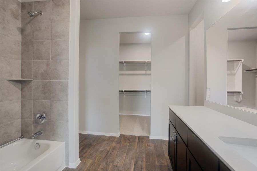 Furnished interior view inside a new home in Oaks at San Gabriel, Georgetown (Image 4).