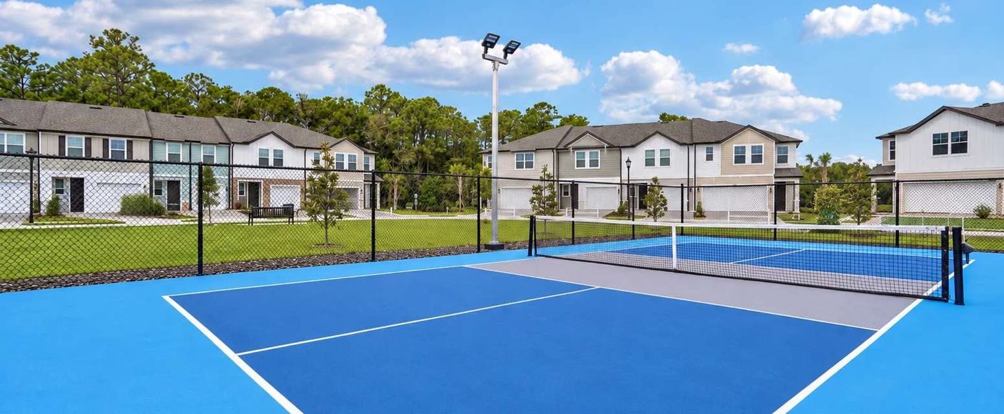 Community pickleball court with lights for evening play