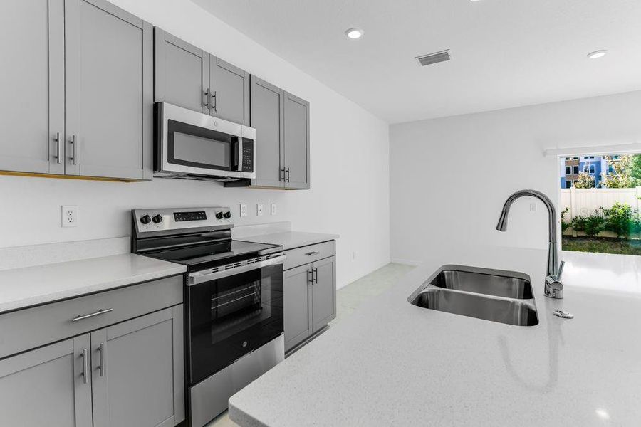 Furnished interior view inside a new home in Vinterra Townhomes, Nokomis (Image 9).