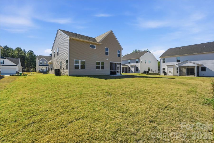 Exterior details and patio area of a home in Clairmont, Charlotte (Image 24).