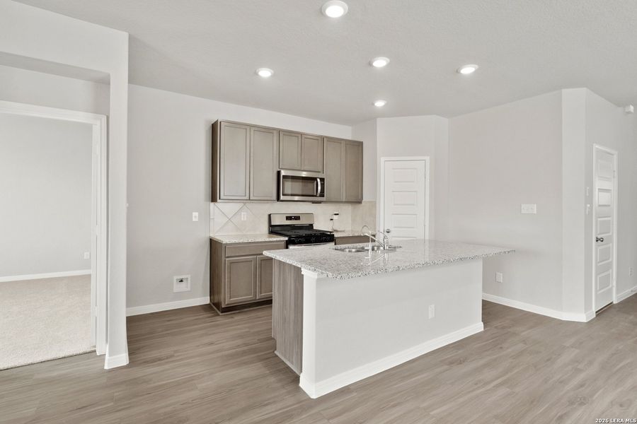 Furnished interior view inside a new home in Hickory Ridge, Elmendorf (Image 11).