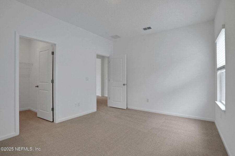 Spacious, unfurnished interior of a new home in TrailMark, St. Augustine (Image 31).