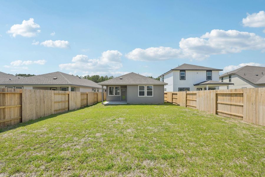 Front exterior of a new home in Landing Meadows - Traditional Series, New Caney, TX, highlighting curb appeal (Image 1).