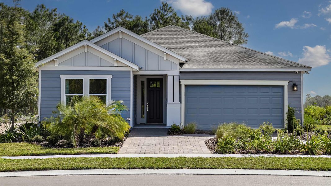 Front exterior of a new home in Colbert Landings, Palm Coast, FL, highlighting curb appeal (Image 23).
