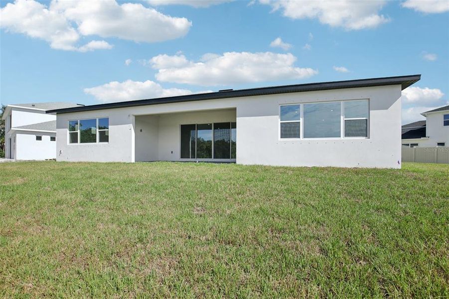 Exterior details and patio area of a home in Biscayne Landing at Seaire, Parrish (Image 2).
