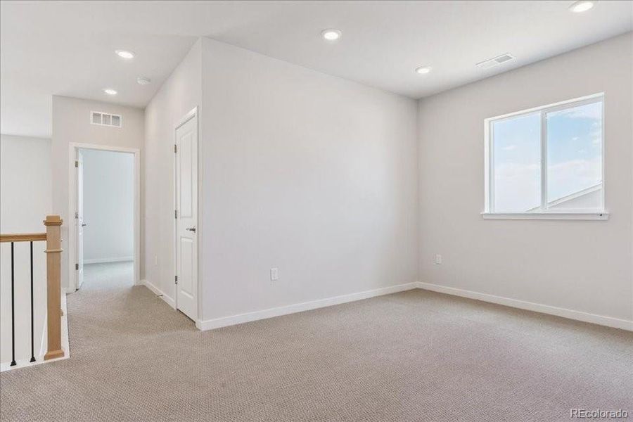 Spacious, unfurnished interior of a new home in Trails at Smoky Hill, Parker (Image 14).