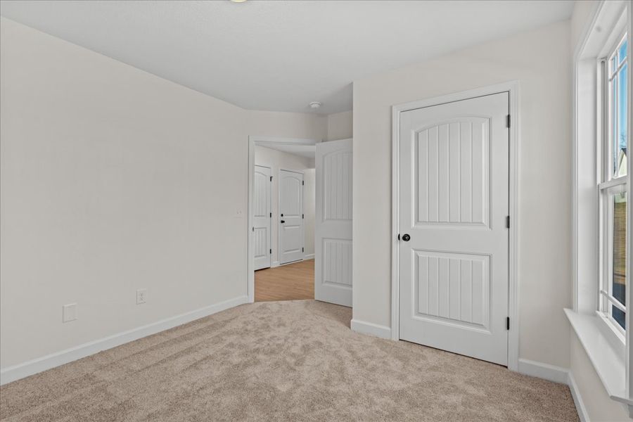 Representative unfurnished interior of a home built from the Cheshire by Enchanted Homes in Hampshire Heights, Moore (Image 28).