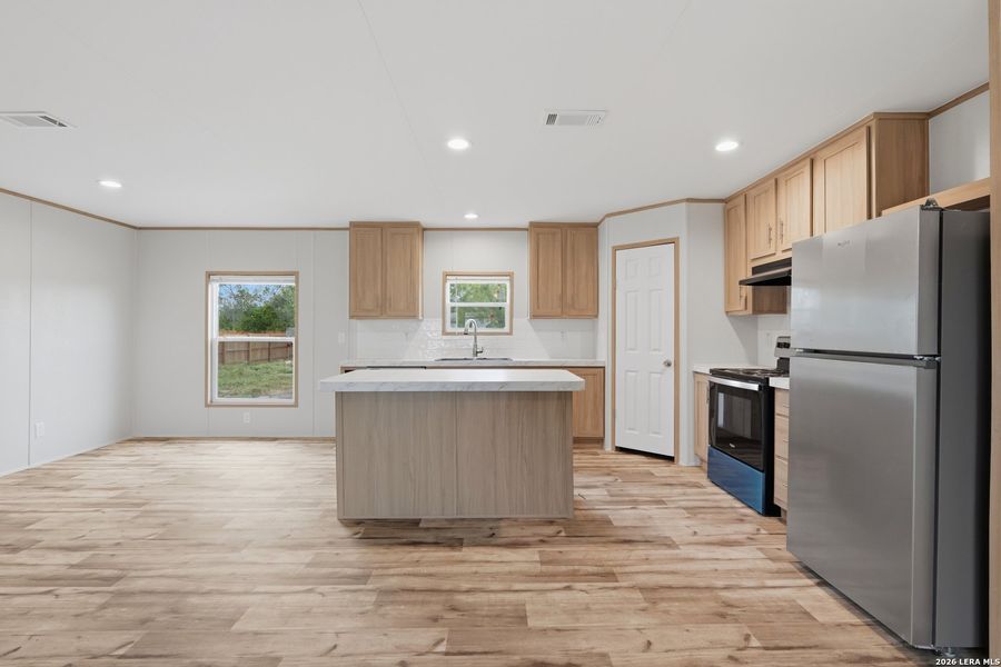 Furnished interior view inside a new home in , Atascosa (Image 7).