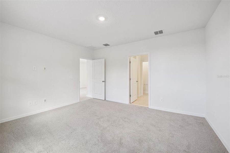 Spacious, unfurnished interior of a new home in Ridgehaven - Villas, Ormond Beach (Image 24).