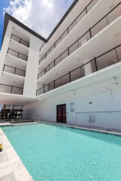 Condo located in Madeira Beach, FL showcasing its design and architecture (Image 4).