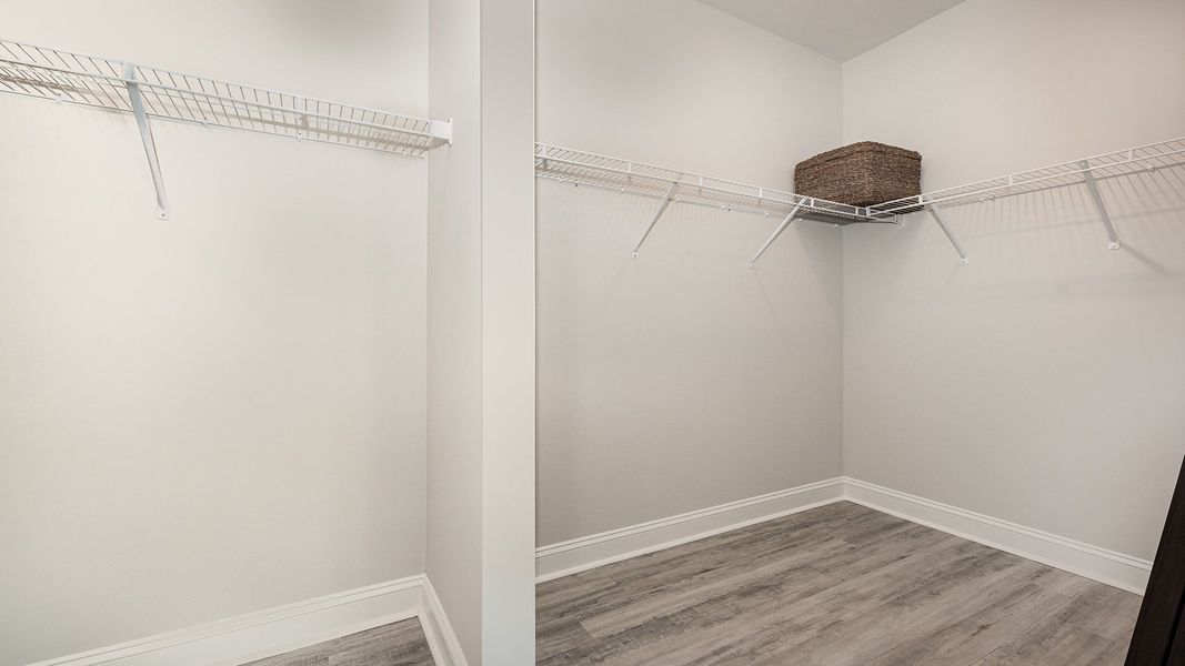 Spacious, unfurnished interior of a new home in Brunswick Plantation, Ash (Image 19).