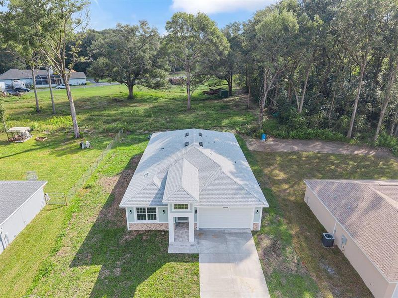 Front exterior of a new home in , Summerfield, FL, highlighting curb appeal (Image 27). Front exterior of a new home in , Summerfield, FL, highlighting curb appeal (Image 27).