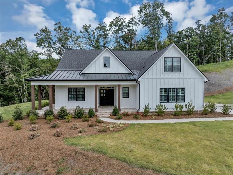 Front exterior of a new home in , Ball Ground, GA, highlighting curb appeal (Image 27).