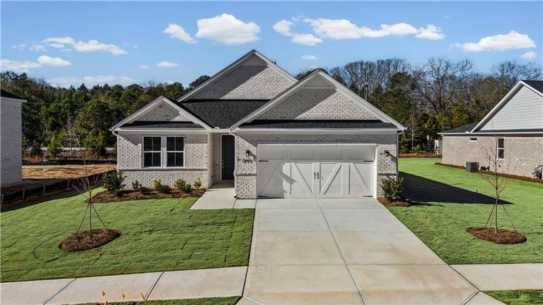 Front exterior of a new home in Overland, Locust Grove, GA, highlighting curb appeal (Image 19).