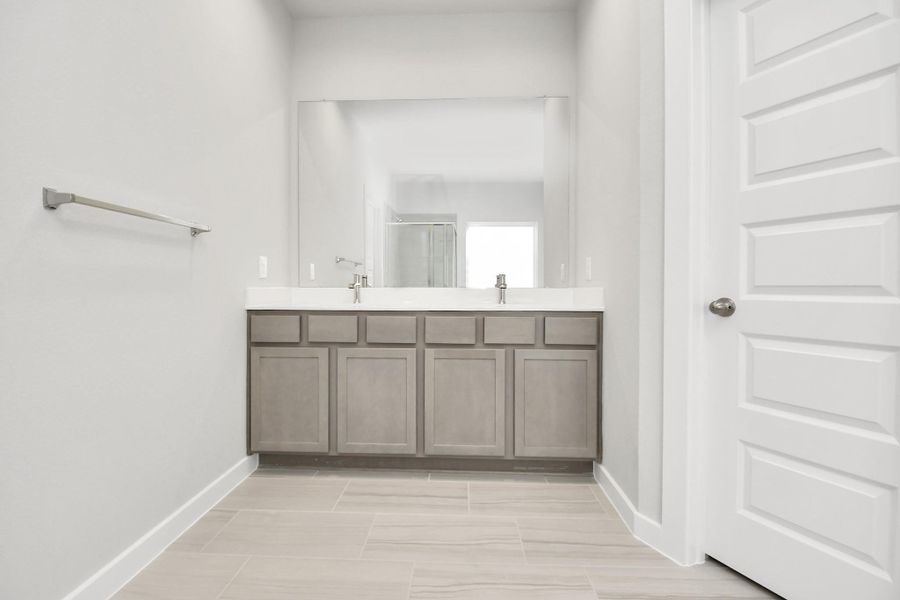 Discover another perspective of the primary bathroom! Sample photo of completed home with similar floor plan. Actual colors and selections may vary.