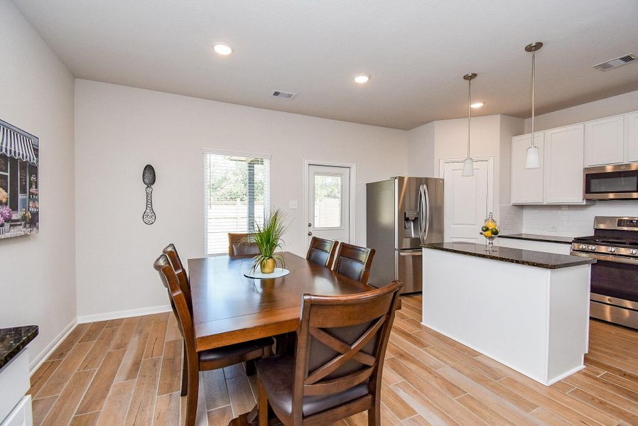 Dining room is open to the kitchen for easy entertaining. Dining room is open to the kitchen for easy entertaining.