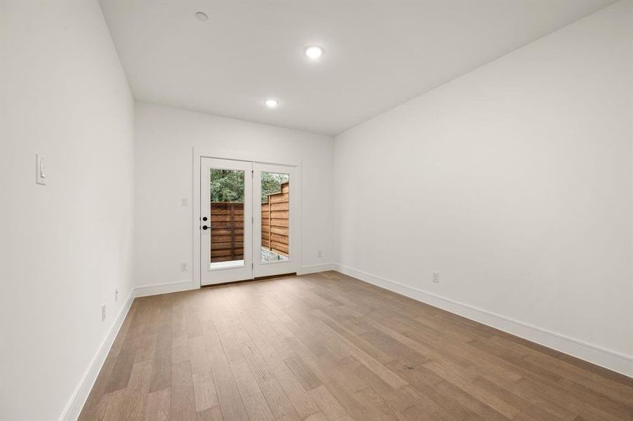 On the main level you'll find a flex space that offers access to your private, fenced outside area. On the main level you'll find a flex space that offers access to your private, fenced outside area.