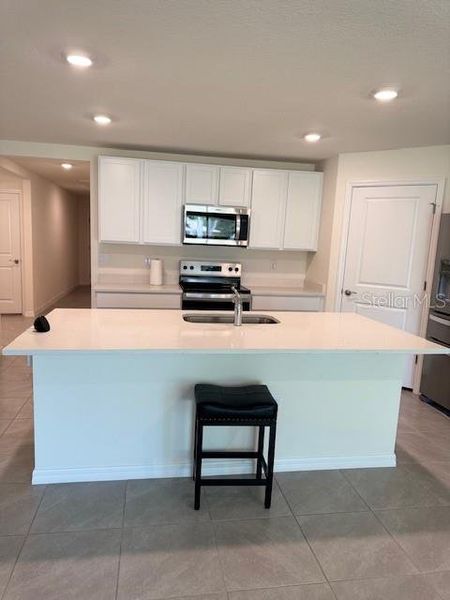Furnished interior view inside a new home in Hernando County Spot Lots, Spring Hill (Image 3).