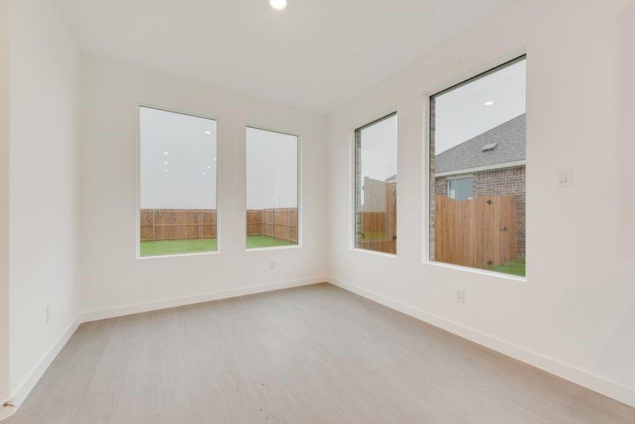 Spare room featuring light wood-type flooring and recessed lighting Spare room featuring light wood-type flooring and recessed lighting