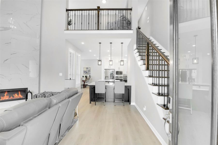 Step inside the grand 8 foot entry door to a light filled stunning interior.