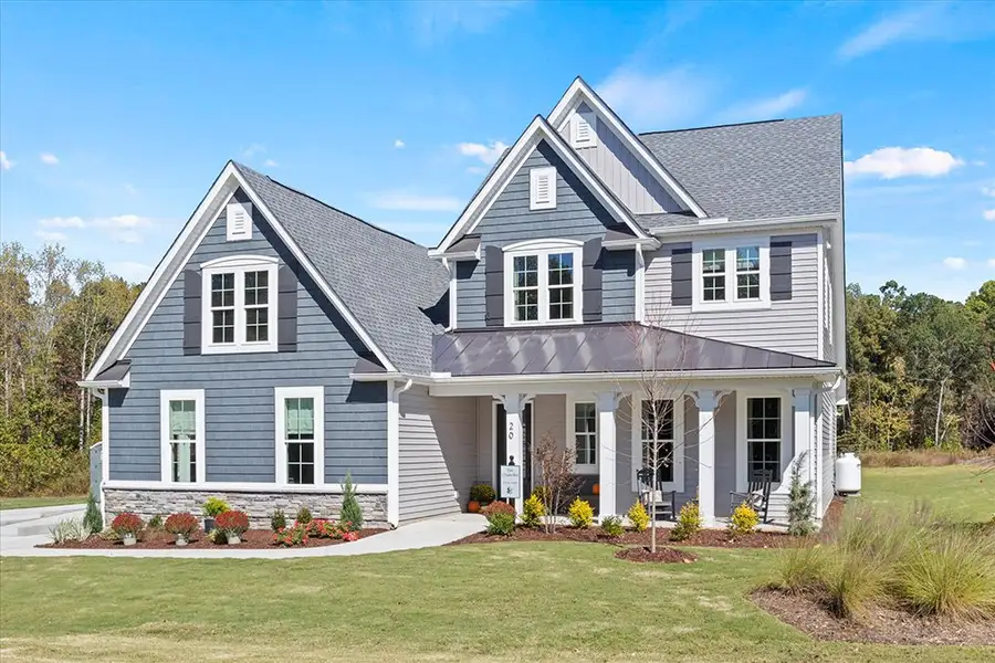 Representative exterior photo of a completed home built from the The Chandler by RobuckHomes in Baylee Ridge, Selma, NC (Image 32). Representative exterior photo of a completed home built from the The Chandler by RobuckHomes in Baylee Ridge, Selma, NC (Image 32).