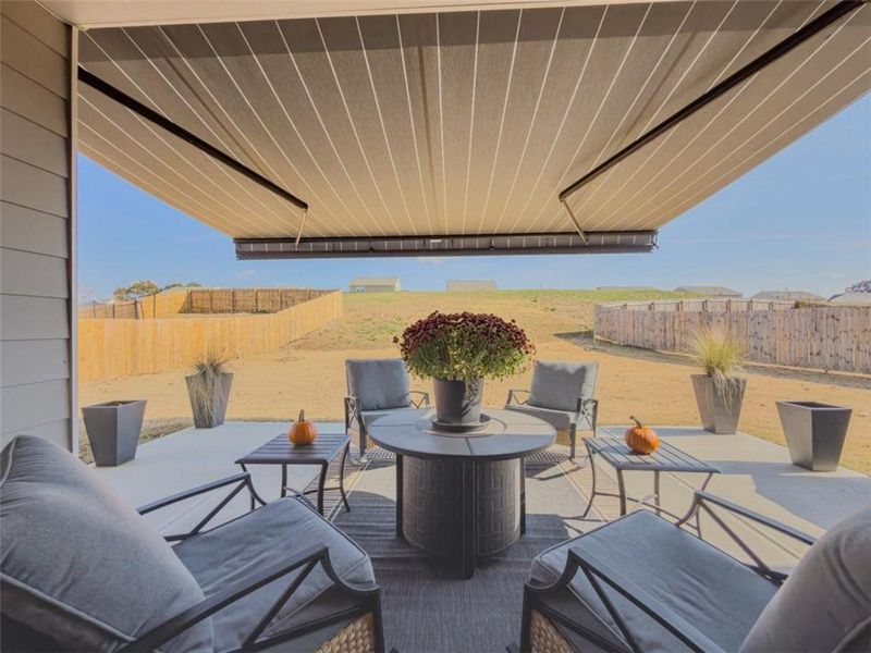 Exterior details and patio area of a home in Bentwater, Hoschton (Image 27). Exterior details and patio area of a home in Bentwater, Hoschton (Image 27).