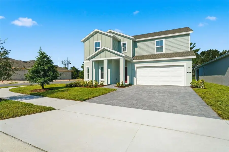 Front exterior of a new home in , Deland, FL, highlighting curb appeal (Image 2). Front exterior of a new home in , Deland, FL, highlighting curb appeal (Image 2).