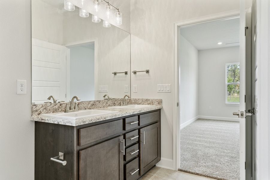 Representative furnished interior of a home built from the 2705 by Adams Homes in Winding Oaks, Weeki Wachee (Image 9).