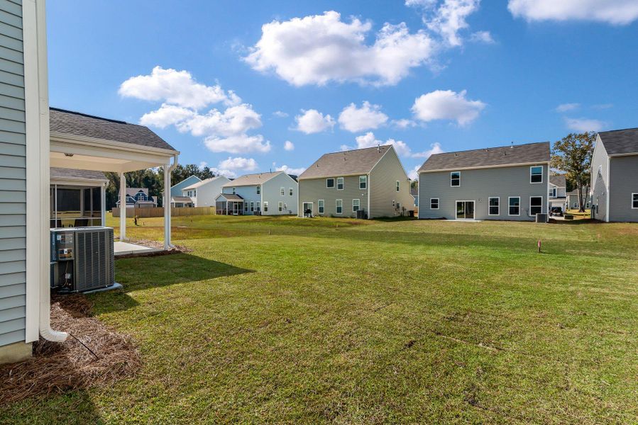 Exterior details and patio area of a home in Oakley Pointe, Moncks Corner (Image 3).