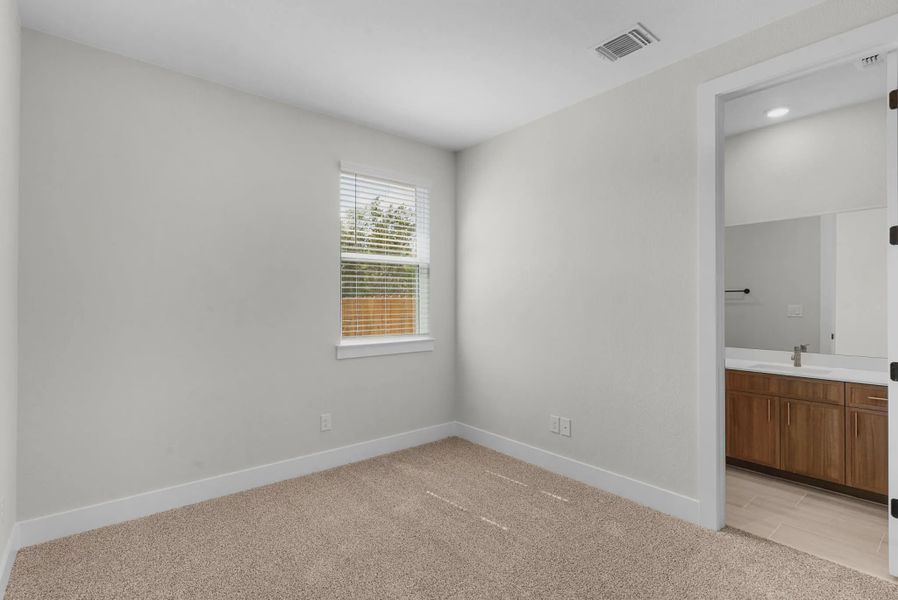 Representative unfurnished interior of a home built from the Brooks by Chesmar Homes in University Heights, McKinney (Image 23).