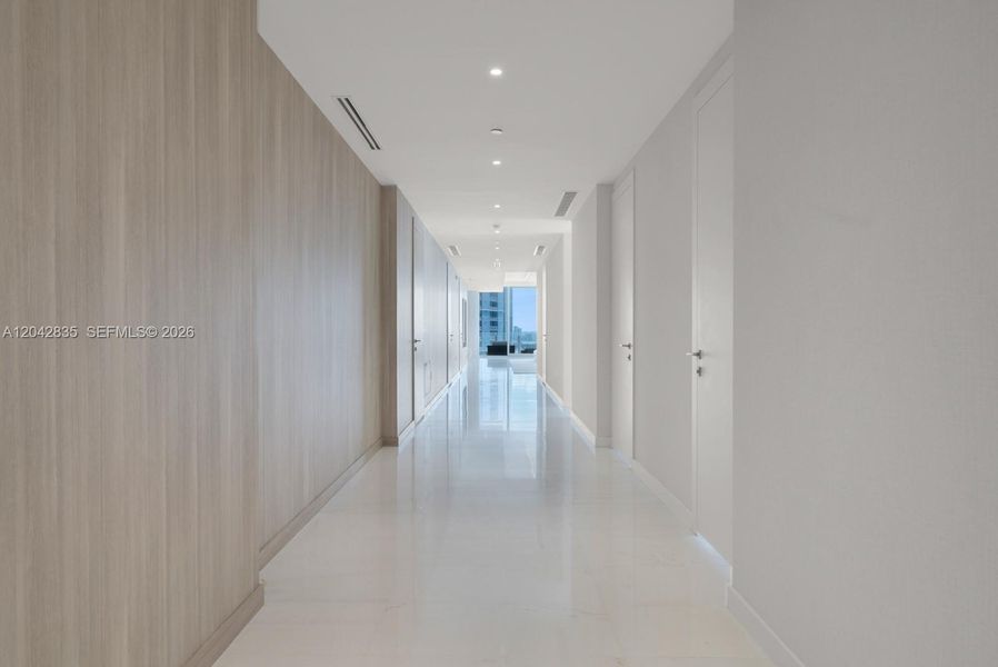 Spacious, unfurnished interior of a new home in Aston Martin Residences, Miami (Image 25).