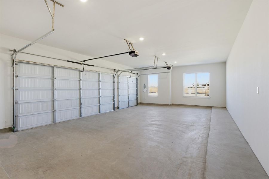Garage featuring recessed lighting