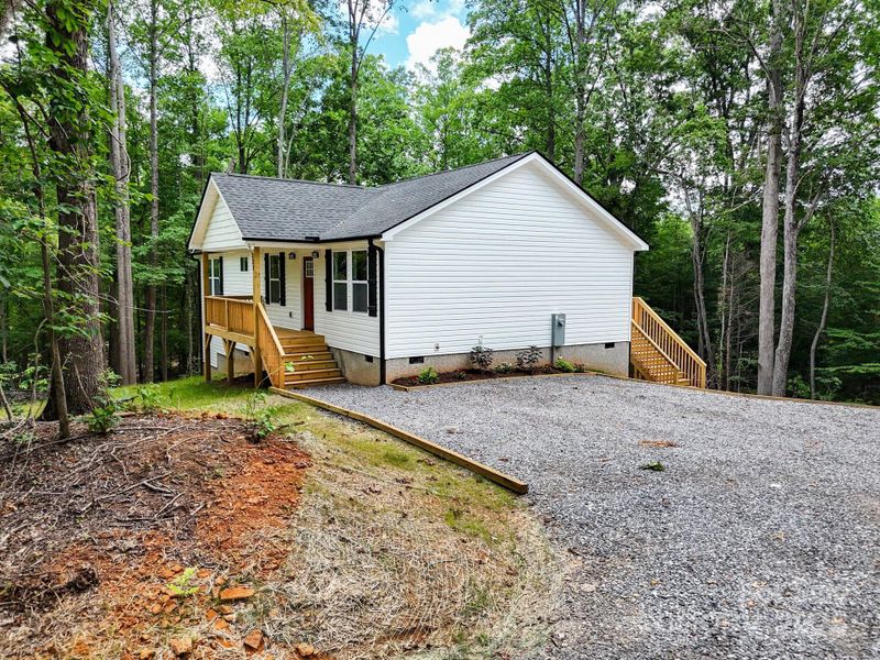 Front exterior of a new home in , Marion, NC, highlighting curb appeal (Image 20).