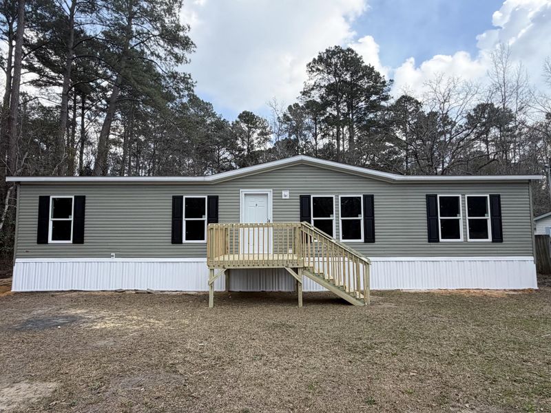 Exterior details and patio area of a home in , Walterboro (Image 9).
