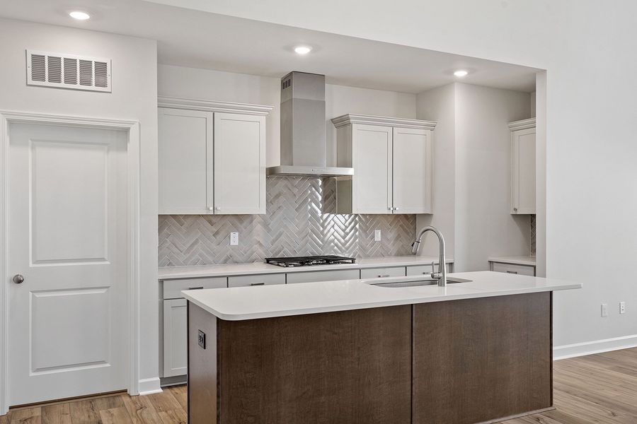 Furnished interior view inside a new home in Ovation at Sweetbrier, Durham (Image 8).