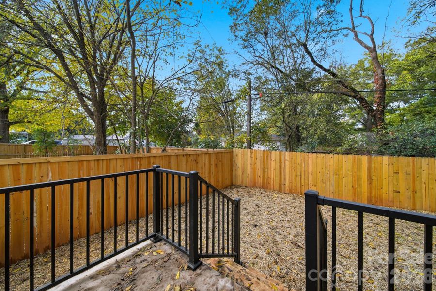 Exterior details and patio area of a home in , Charlotte (Image 29).