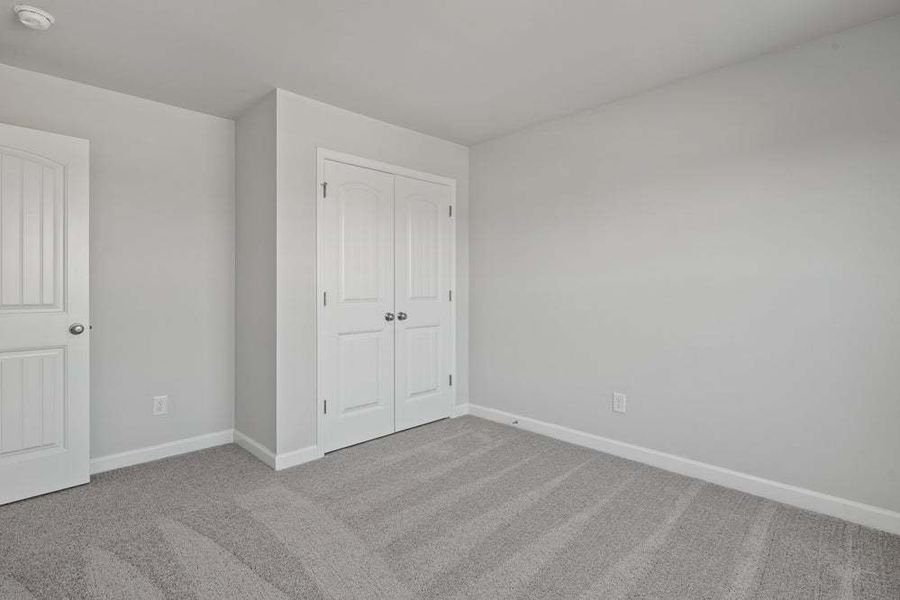 Representative unfurnished interior of a home built from the Camellia by Caviness & Cates Communities in Bartlett Manor, Youngsville (Image 63).